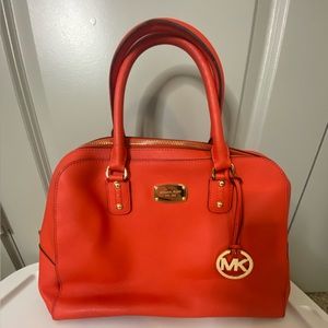 Michael Kors bag. Orange leather with gold hardware. Excellent condition! 🧡
